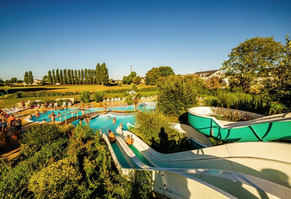 Swimming pool slides at our campsite in Isigny-sur-Mer - 4-star Le Fanal campsite in Normandy